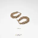 Aretes con diseño trenzado